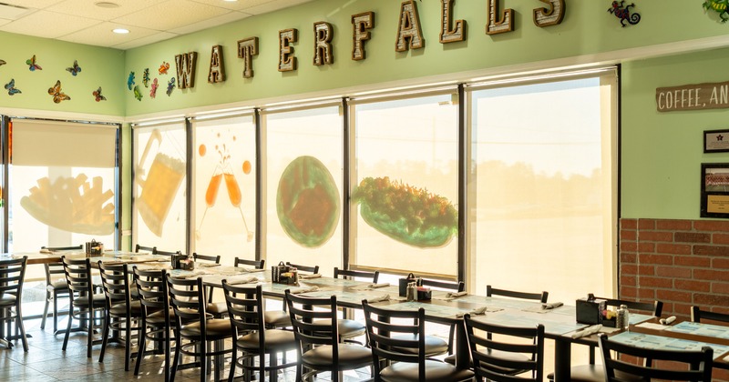 Interior dining area with tables set for guests