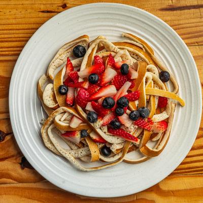 Pancakes and fruits.