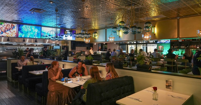 Interior, main dining area full with guests