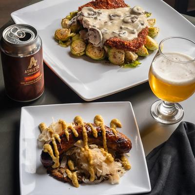Bratwurst latke served with Brussels sprouts and beer.