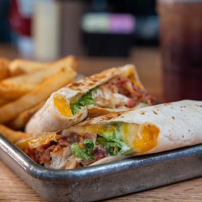 Chicken Tender Club Wrap and fries.