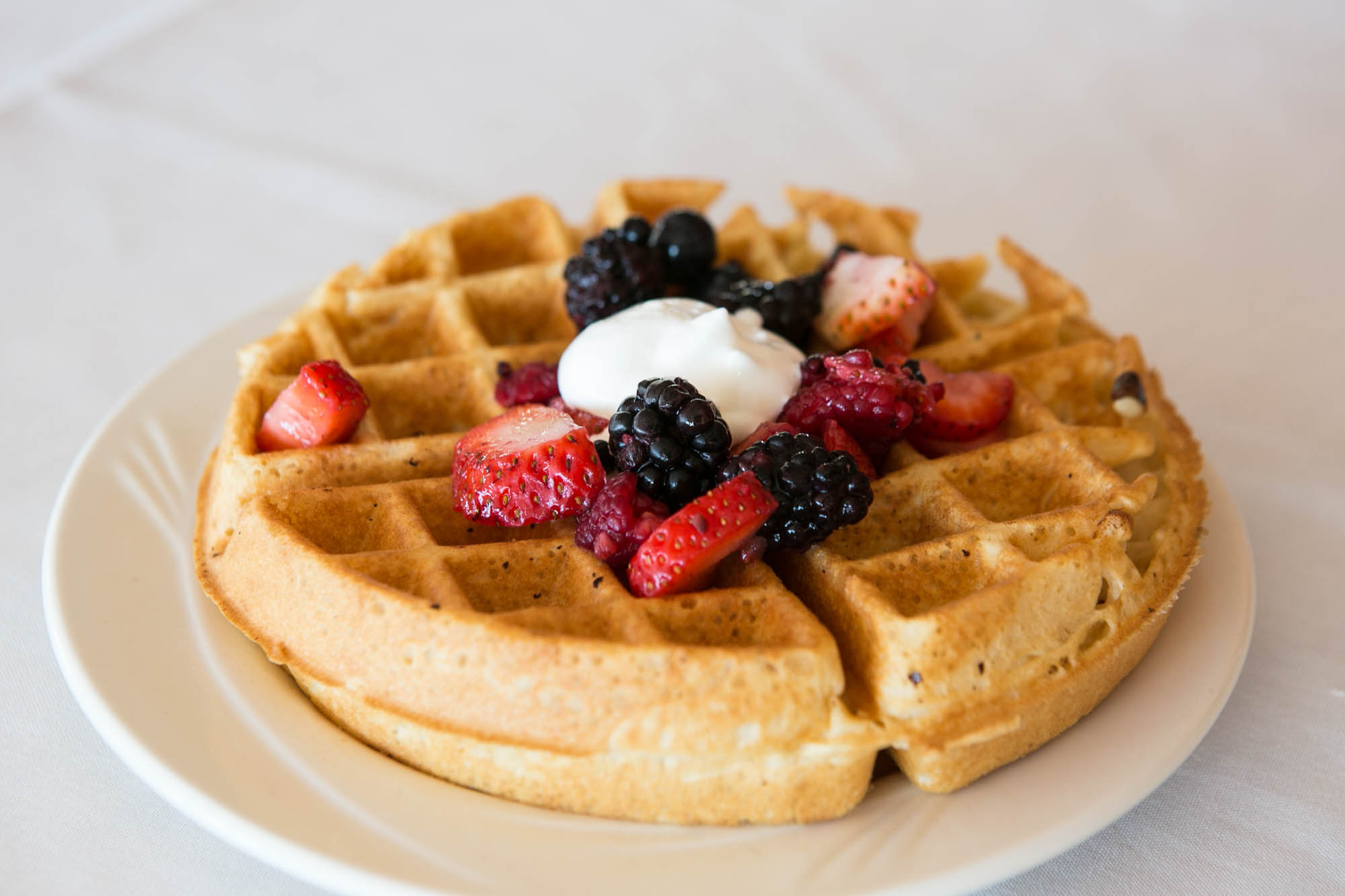 Belgian Waffle, with berries and whipped cream