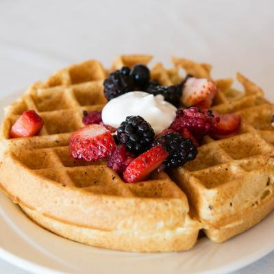 Belgian Waffle, with berries and whipped cream.