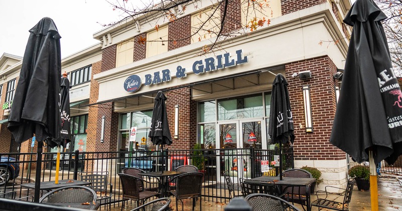 Outside entrance, chairs and tables