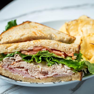 A sandwich with chips.