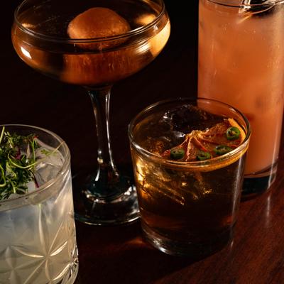 Various cocktails displayed on the table, close view.