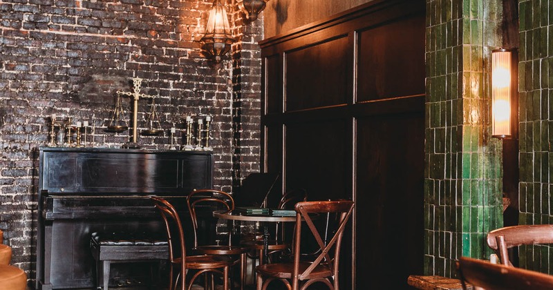 Interior, seating place with piano in the back