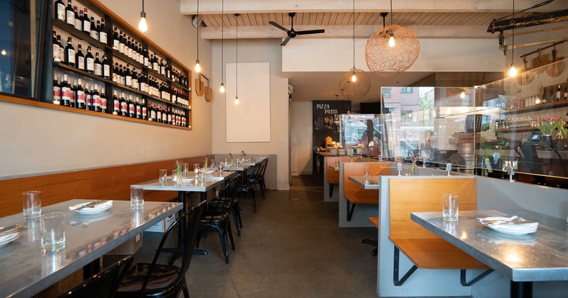 Interior, lined up seating and tables ready for guests