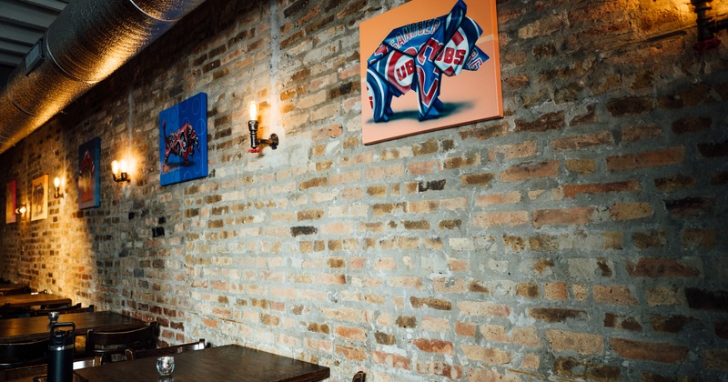 Interior, seating area, brick wall with artwork