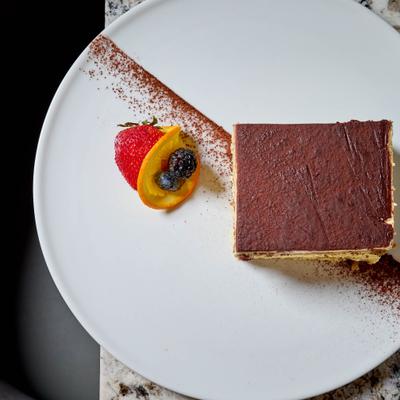 Slice of Tiramisu cake.