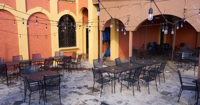 Exterior, patio, black tables and chairs