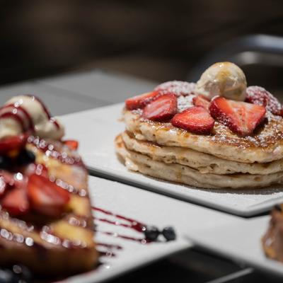 Pancake and french toast plates, close up.