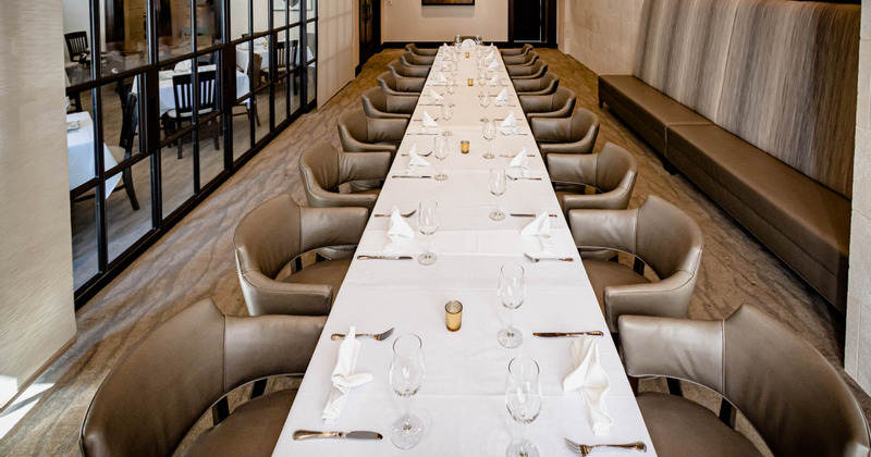 Long table set and ready for guests