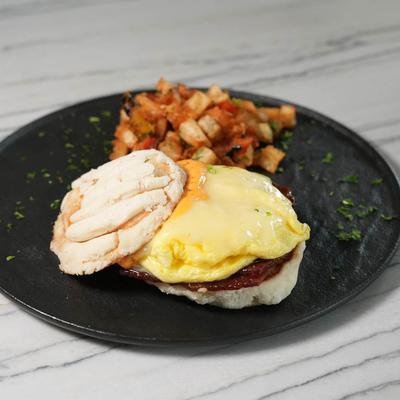 Egg and meat breakfast sandwich.