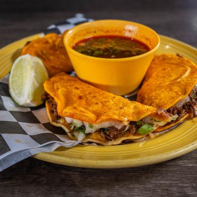 Birria Tacos, side view.