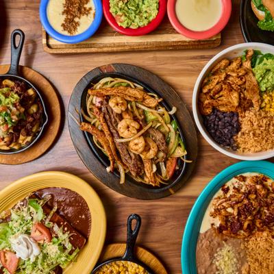 Assorted Mexican dishes on a table.