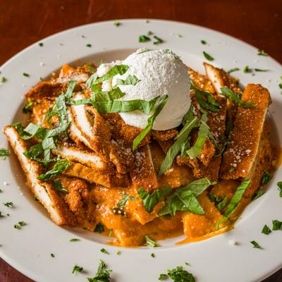 Stuffed rigatoni with breaded chicken and tomato sauce.