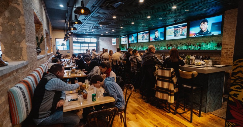 Interior, guests sitting at tables