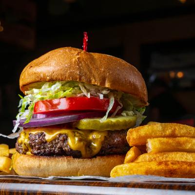 Nino's Burger served with fries.