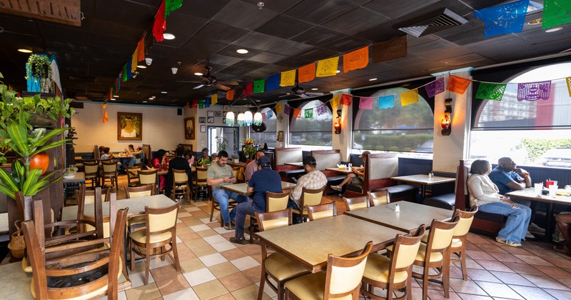 Interior, dining area with colorful hanging decorations
