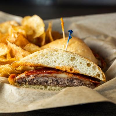 Burger of the Month served with chips