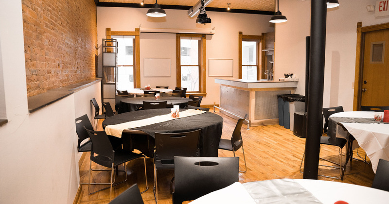 Interior, round guest tables with chairs