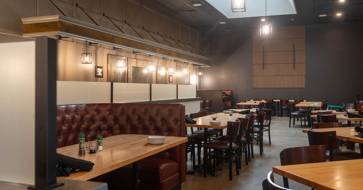 Interior, seating area, tables ready for guests