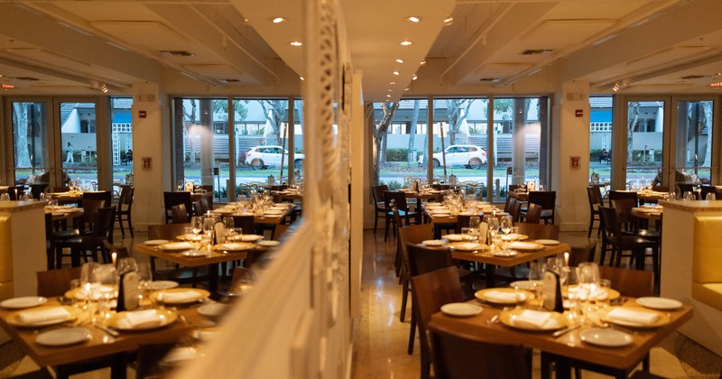 Interior, dining space with large mirror on the wall