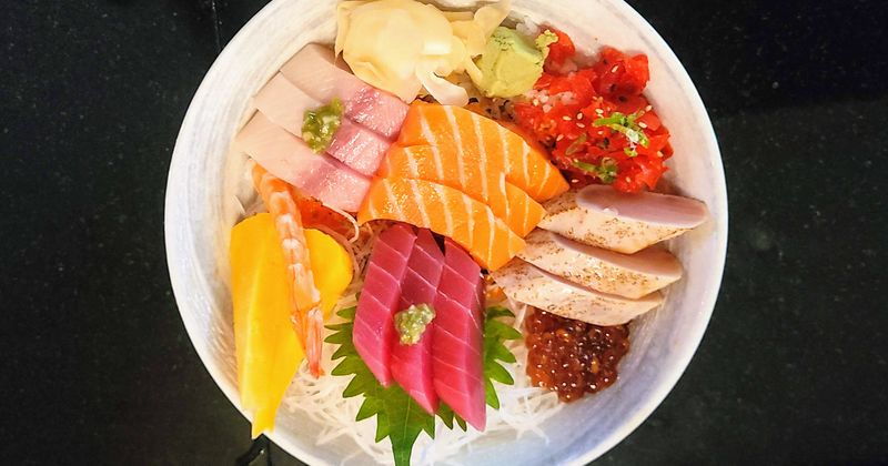 Different types of fresh fish, vegetables on the side