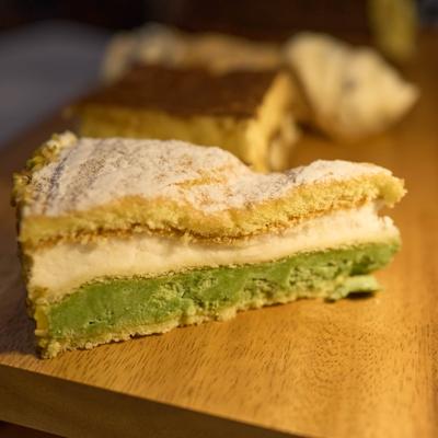 A slice of Pistachio Ricotta Cake.
