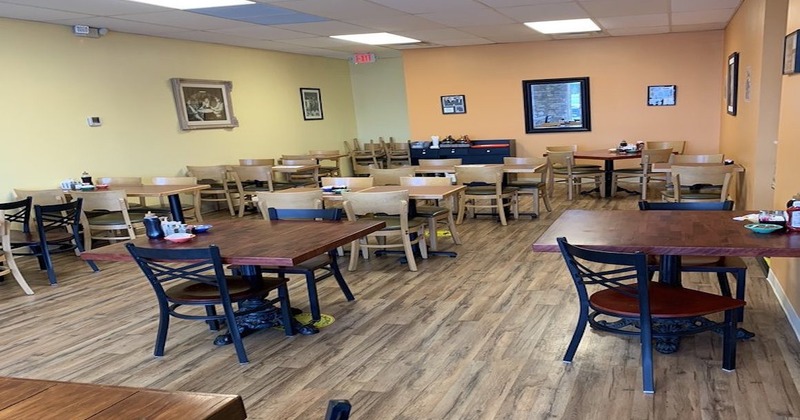 Dining room with tables and chairs