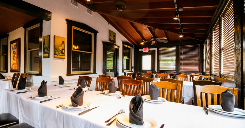 Restaurant interior with dining set tables