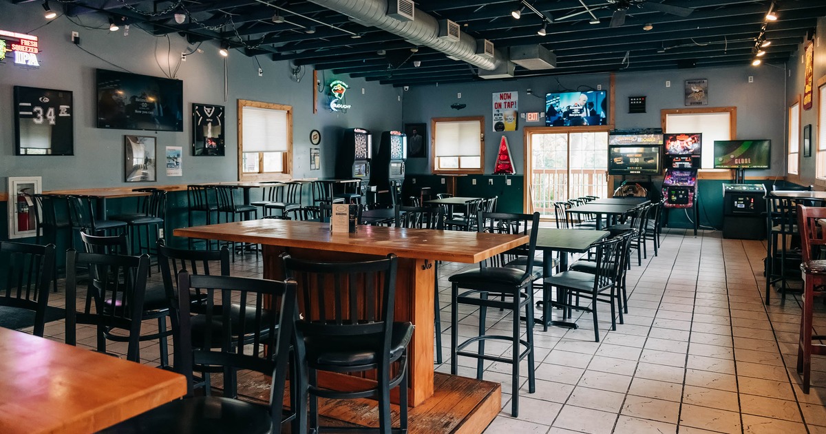 Interior, tables and chairs in seating area