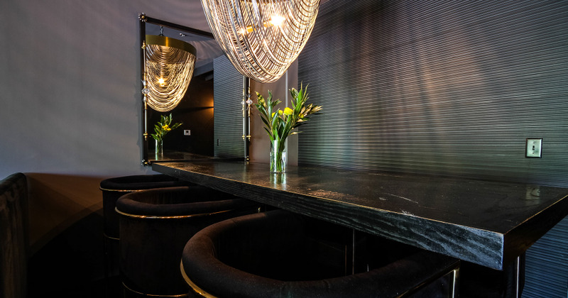 Interior, mirror and flowers on a table
