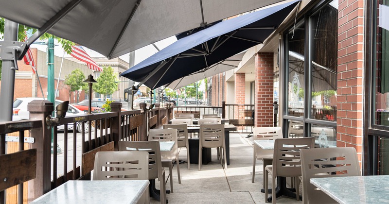 Exterior, sidewalk patio, table and chairs