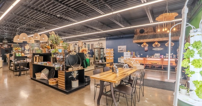 Spacious covered seating area with merch shelves