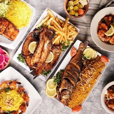 Assortment of food dishes on a table, overhead view.