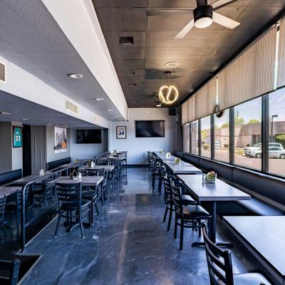 Interior, diner area, tables, chairs.