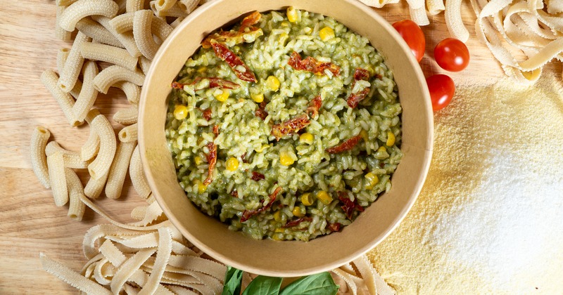 Green pesto risotto with corn and sun-dried tomatoes