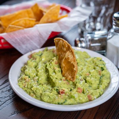 Guacamole with tortilla chips.