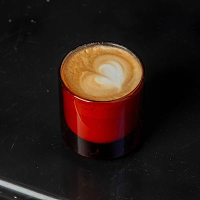 Cup of cappuccino on the table.