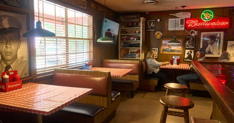Interior space, dining area, lined up dining booths