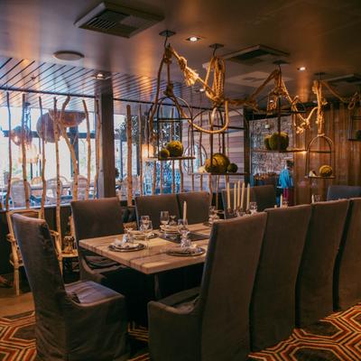 Interior, tables set for dining