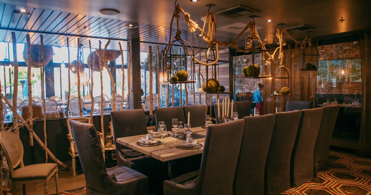 Interior, seating area, tables ready for guests