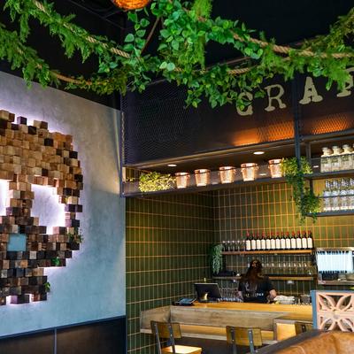 Restaurant dining area, wall art.