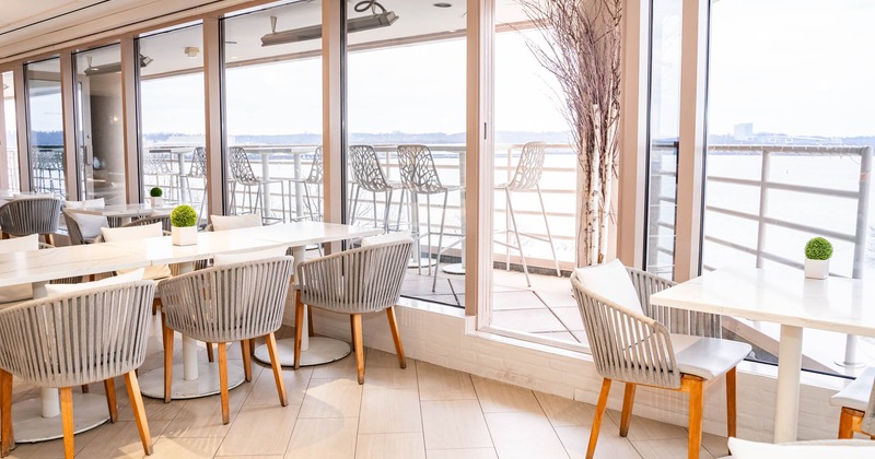 Inside, seating area with tables and chairs