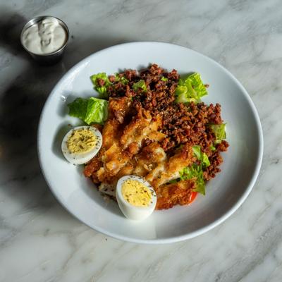 Served cobb salad in the plate.