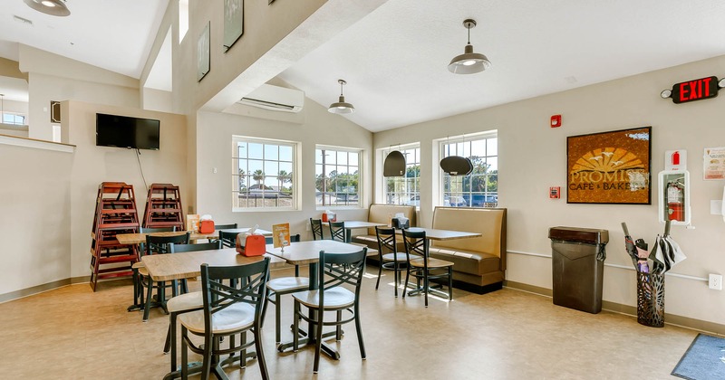 View of dining area, two seating booths on the right