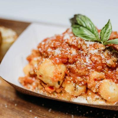 Potato gnocchi, with tomato sauce and basil.