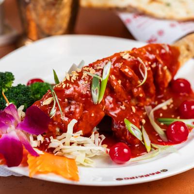 Red Snapper, smothered in red sauce.